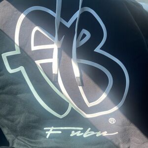 FUBU Black Garment with Red Accents